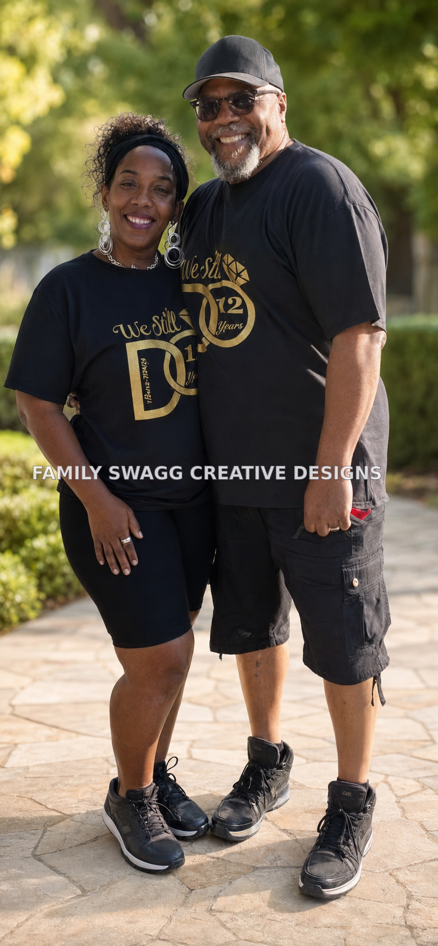 Couple wearing matching black and gold 12-year anniversary shirts