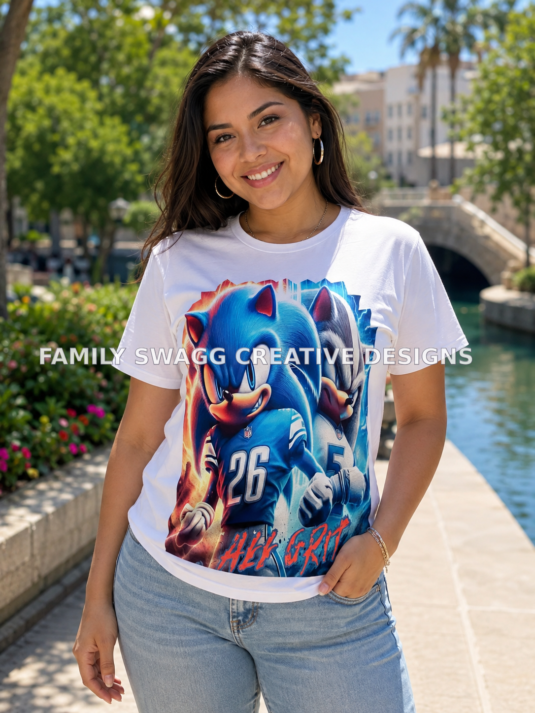 Young Latina woman modeling a vibrant blue character All Grit statement shirt outdoors