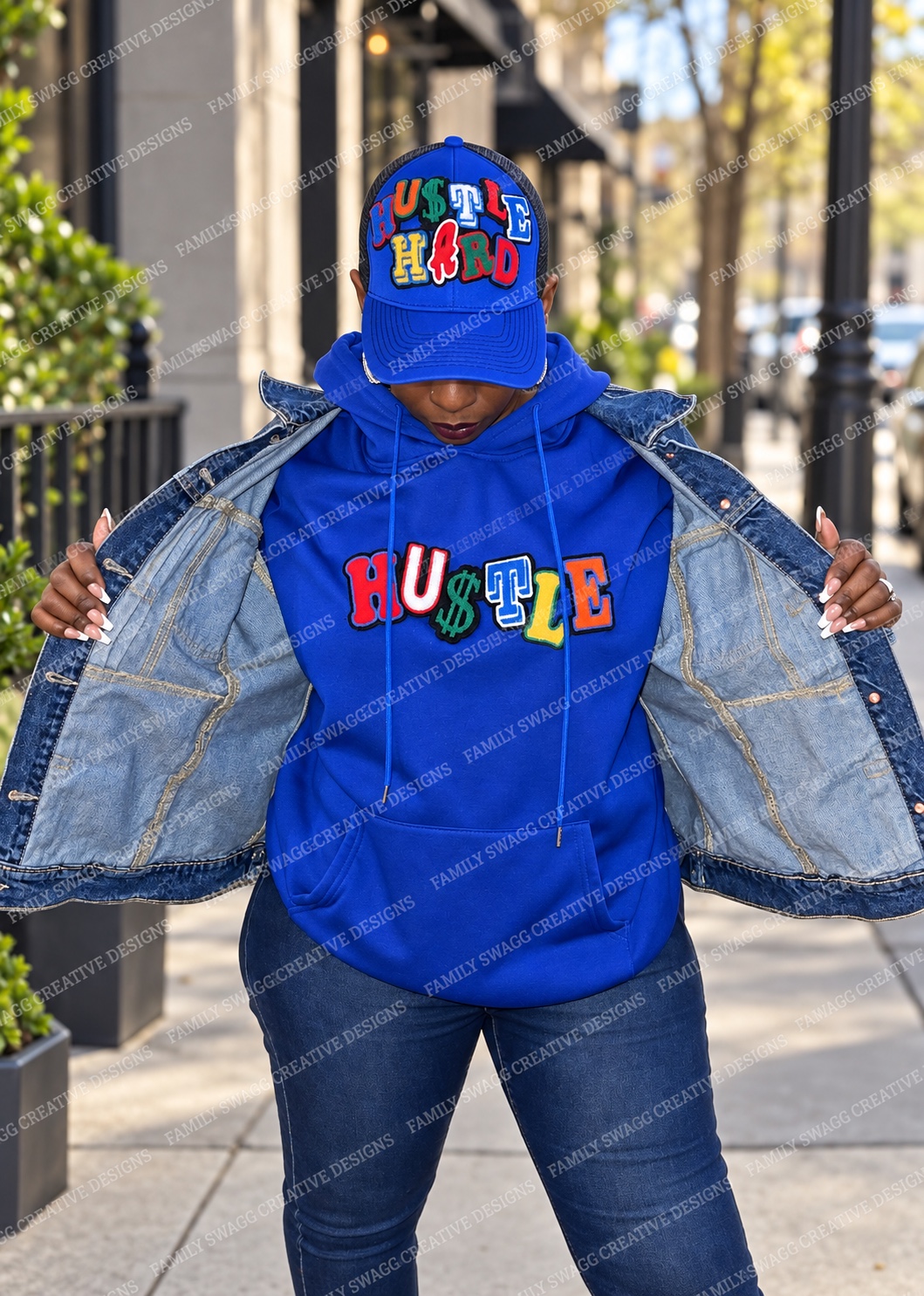 Custom royal-blue hoodie and matching hat created with colorful limited-quantity patches