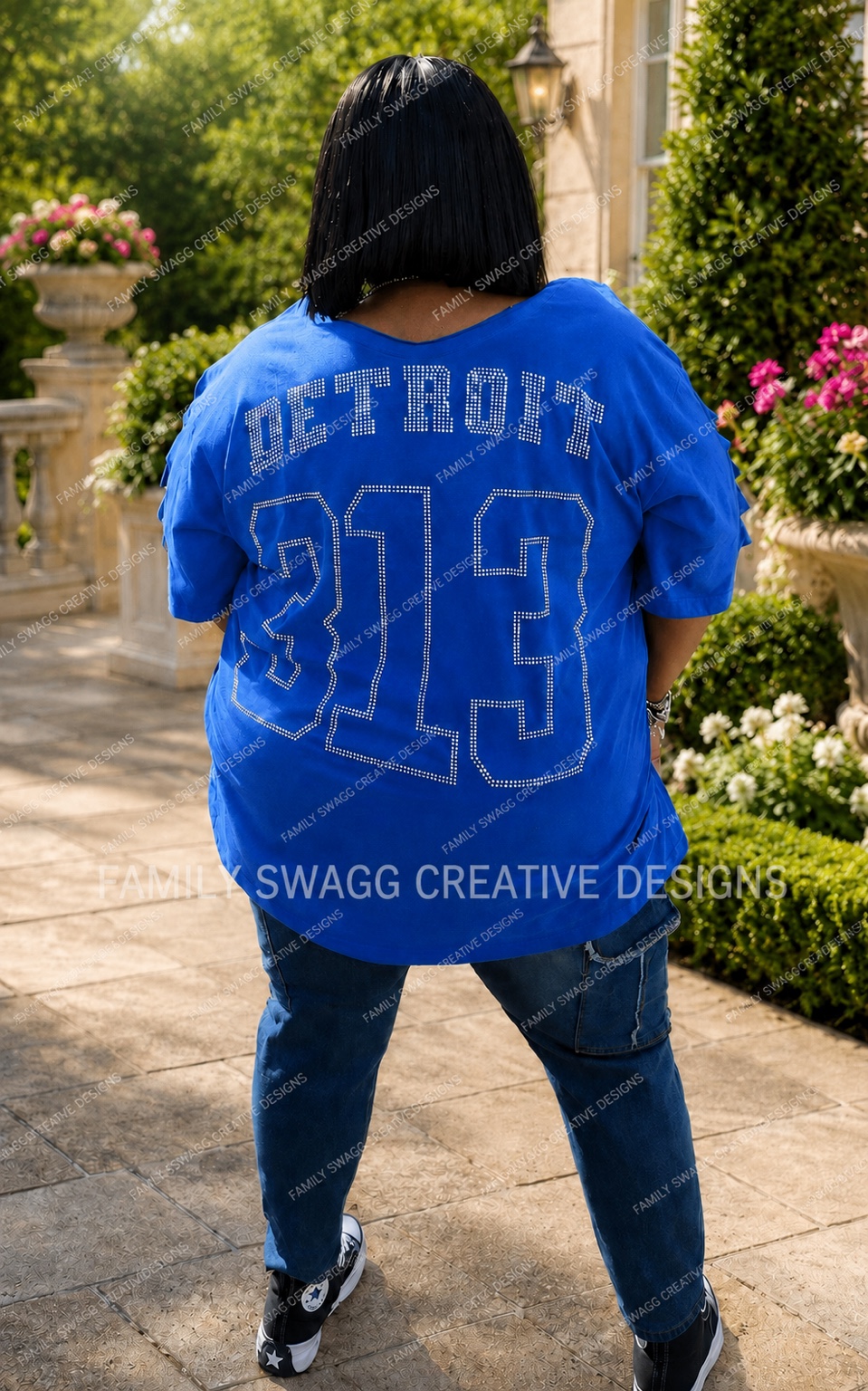 Back view of a royal-blue Detroit 313 rhinestone shirt outdoors